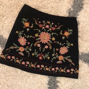 High waisted black and floral skirt size small.